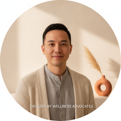 Headshot of Dr. Kevin Wu, a North American man with a calm, reassuring expression, wearing professional attire against a warm