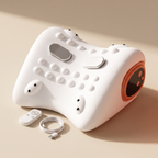 White multifunctional cervical massage pillow with remote and cable on a cream studio backdrop